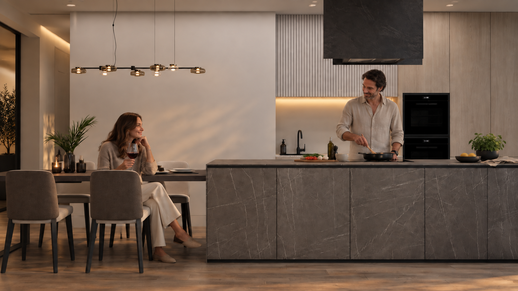 A couple spending a quiet evening in a RAUM kitchen