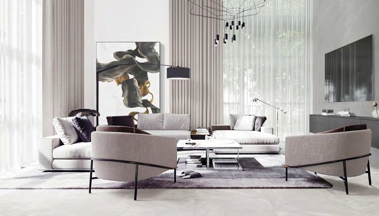 Sunlit living space with sculptural furniture and tall windows